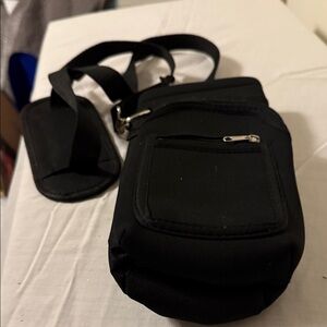 Great for hikers water bottle plus I'd ing
O holder Black Men's Crossbody Bag